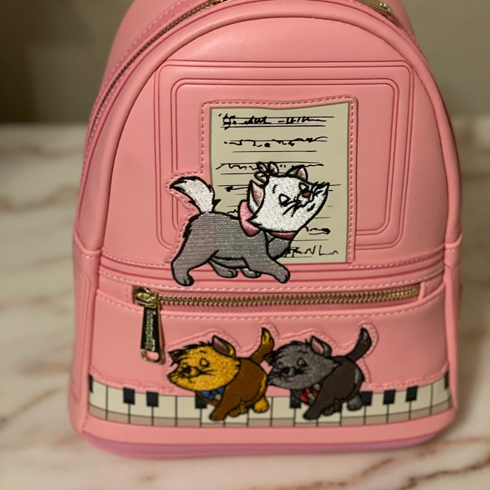 NWT Loungefly Aristocats Pink Piano Kitties Mini Backpack with piano key straps!